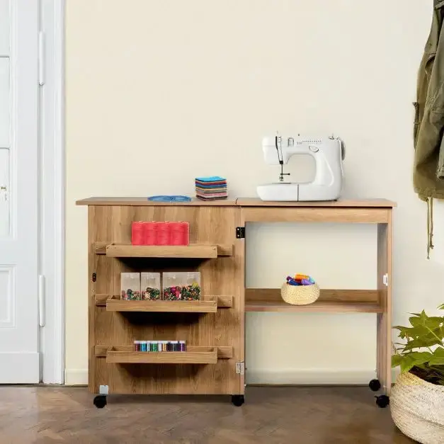 Natural-Finish Rolling Sewing Table – Foldable Cabinet with Storage Bins, Shelf & Casters for Easy Mobility by COSTWAY